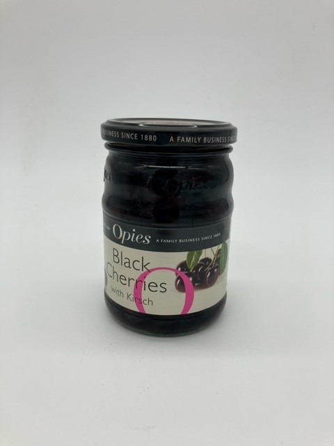jar of black cherries in kirsch