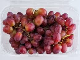 punnet of red grapes